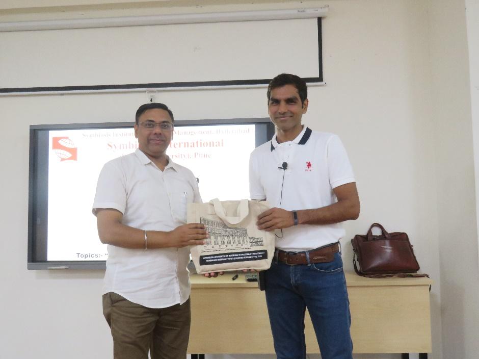 Felicitation to CA Vikas Jain by Dr. Tanmoy De, SIBM Faculty