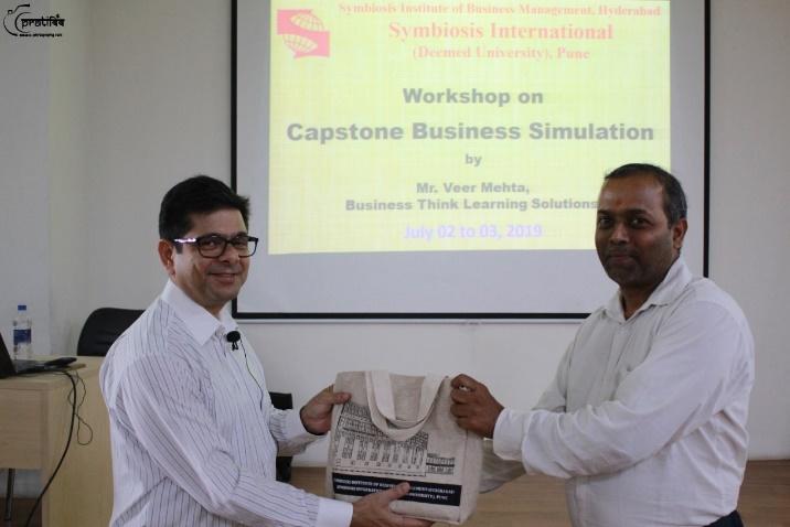 Mr. Veer Mehta felicitated by Dr. Satya Prasad V. K. - SIBM-Hyd