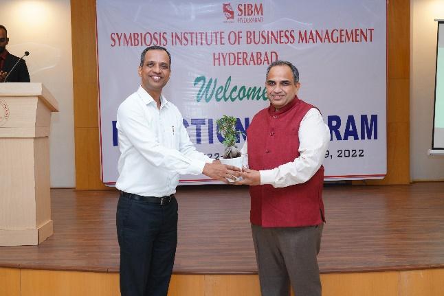 Director felicitating the guests at SIBM Hyderabad