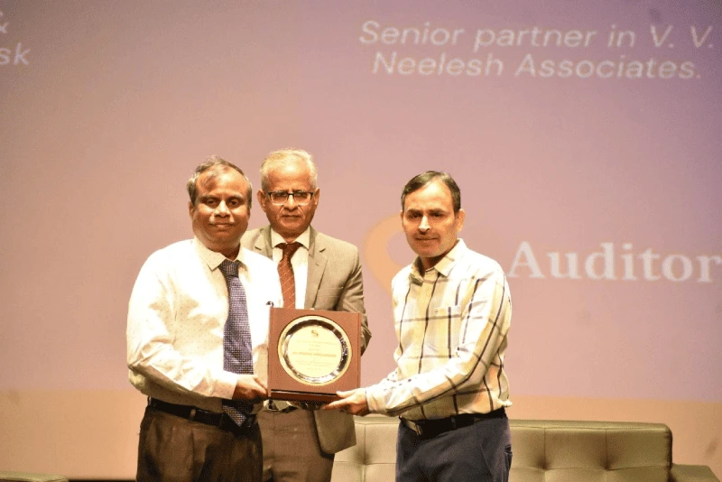 Dr. Hariprasad Soni felicitating CA V Srinivas