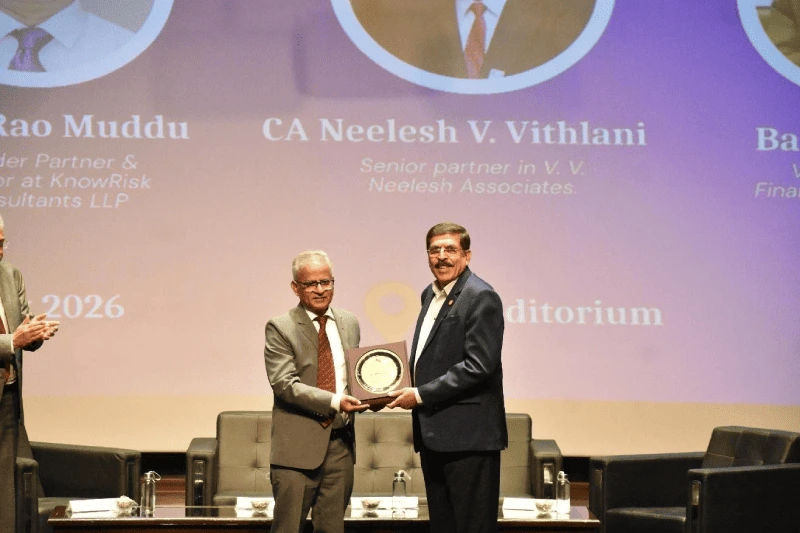 Dr. Shyamsunder Chitta felicitating Mr. Annaji Rao Muddu