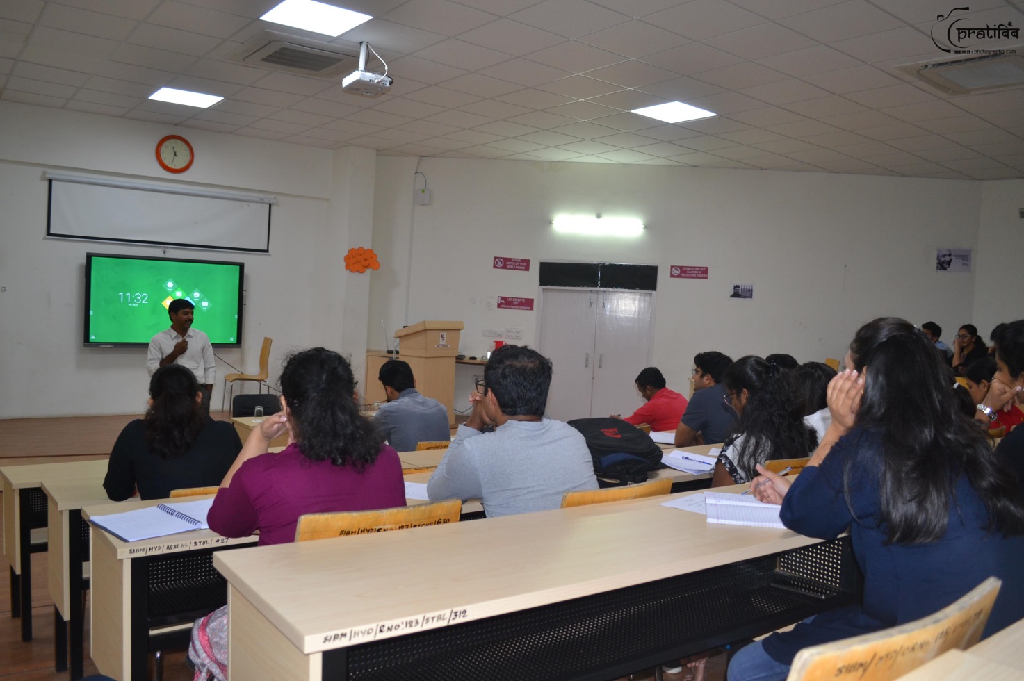 Mr. Vamsi addressing SIBM students